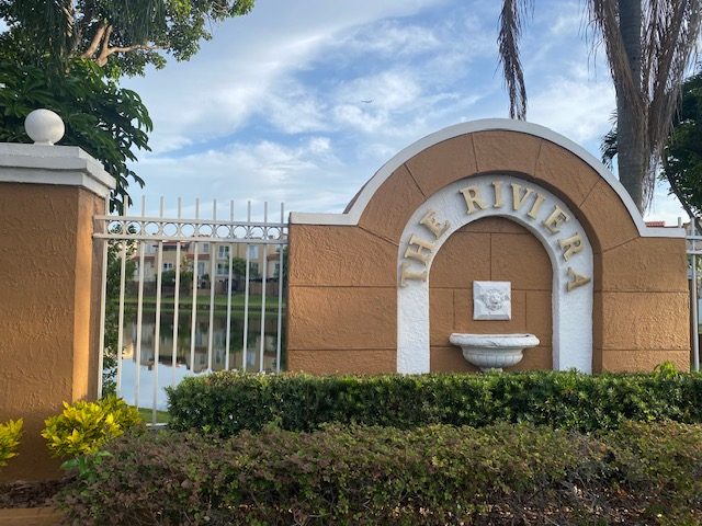 The entrance monument at The Riviera at Coral Lakes