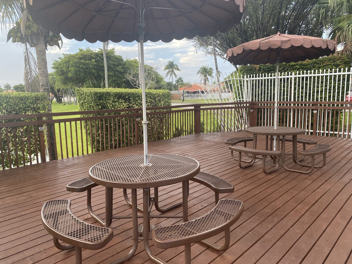 A shaded community deck and gazebo