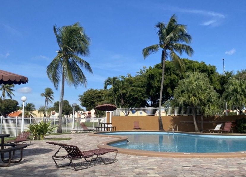 A community pool and sun deck