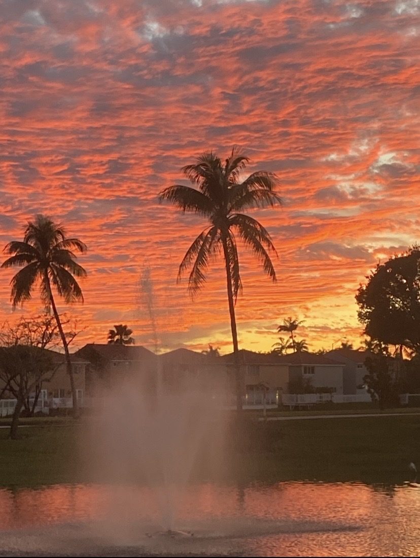 Sunset over a Coral Lakes lake and fountain